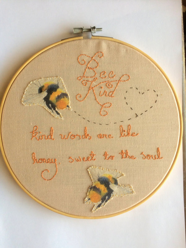 'Bee Kind. Kind words are like honey, sweet to the soul'. Hand embroidered wall décor. 8" diameter. Finished with a felt backing, ready to be hung on your wall, or your friends!