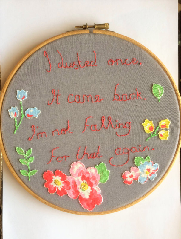 Hand embroidered wall décor. 8" diameter. Finished with a felt backing, ready to be hung on your wall, or your friends!